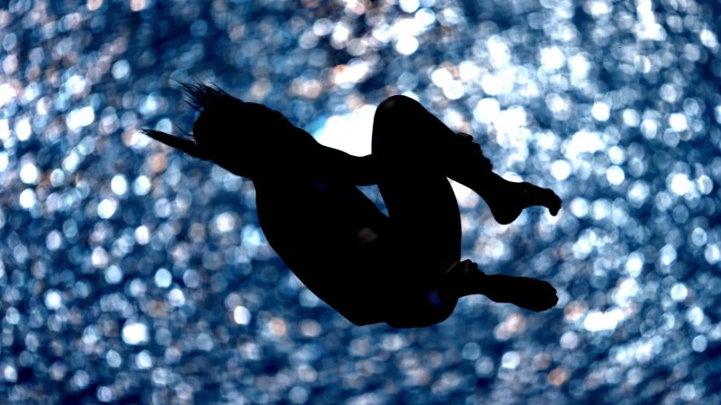 Malaysian diver Pandelela Rinong tucks her body as she competes in the 10-meter platform Saturday, March 21, during a Diving World Series event in Dubai, United Arab Emirates.