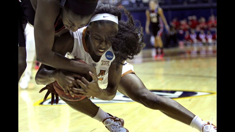 Western Kentucky guard Alexis Govan, left, battles for the ball with Texas' Tasia Forman during an NCAA Tournament game played Friday, March 20, in Berkeley, California. Texas advanced to the second round with a 66-64 victory.
