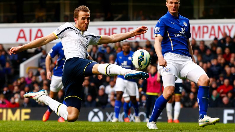 Tottenham's Harry Kane takes a shot against Leicester City during a Premier League match played Saturday, March 21, in London. Kane had a hat trick in the 4-3 home win, and he now has 29 goals over all competitions this season.
