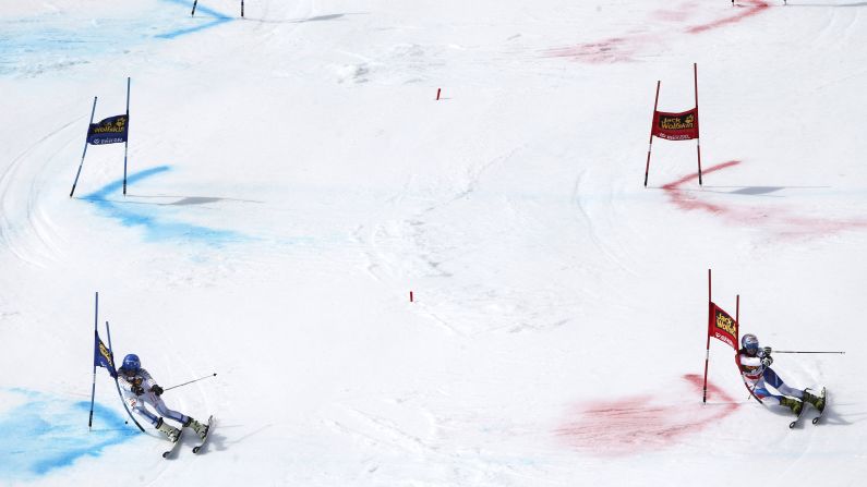 Sweden's Anna Swenn-Larsson, left, competes against Switzerland's Charlotte Chable at the World Cup Finals on Friday, March 20.