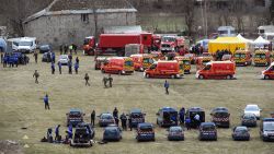Emergency workers and members of the French Gendarmerie gather on March 24 in Seyne, France, near the site where the plane crashed.