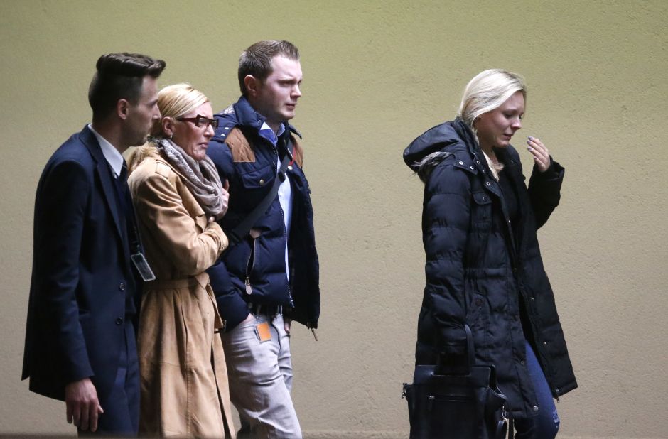 People arrive at the Dusseldorf Airport on March 24.