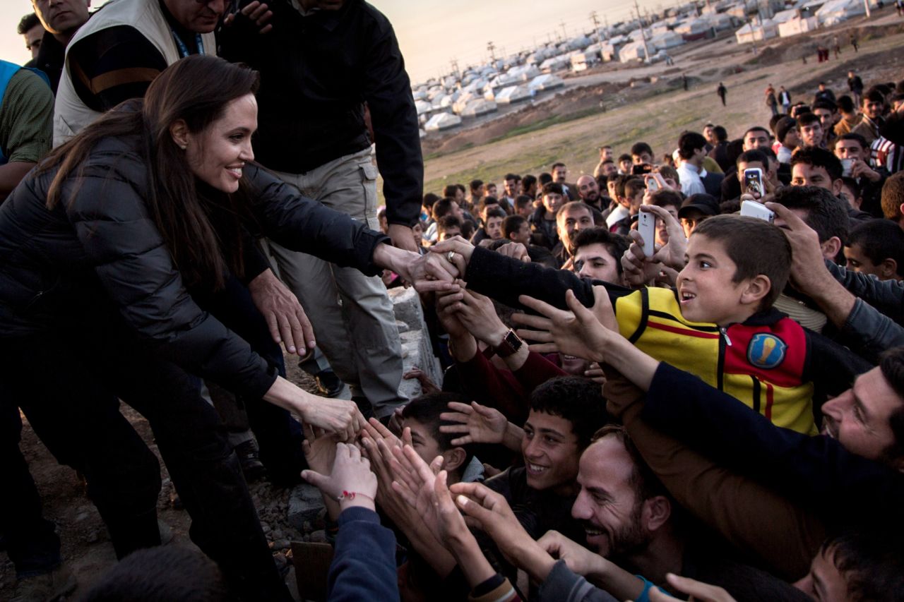 Angelina Jolie meets members of the Yazidi minority at a refugee camp in Khanke, Iraq, in January 2015.