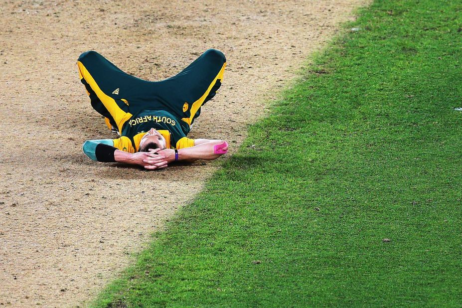 Steyn lies devastated after South Africa's defeat. It was the fourth time it had been beaten at the semifinal stage in the one-day tournament.