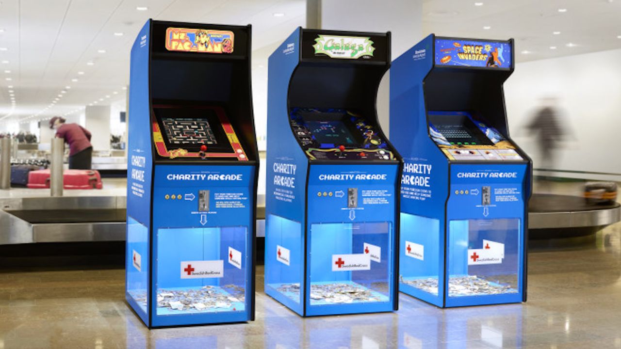 Sweden's two biggest airports have installed custom-made old school video games that will take coins of any currency. All the money is donated to the Swedish Red Cross. 