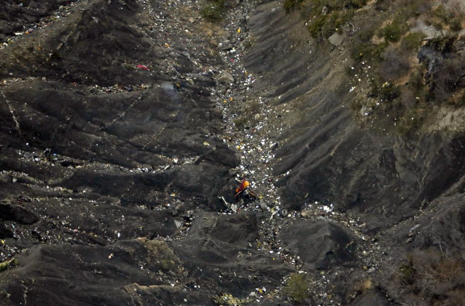 Wreckage is seen at the crash site on March 24.