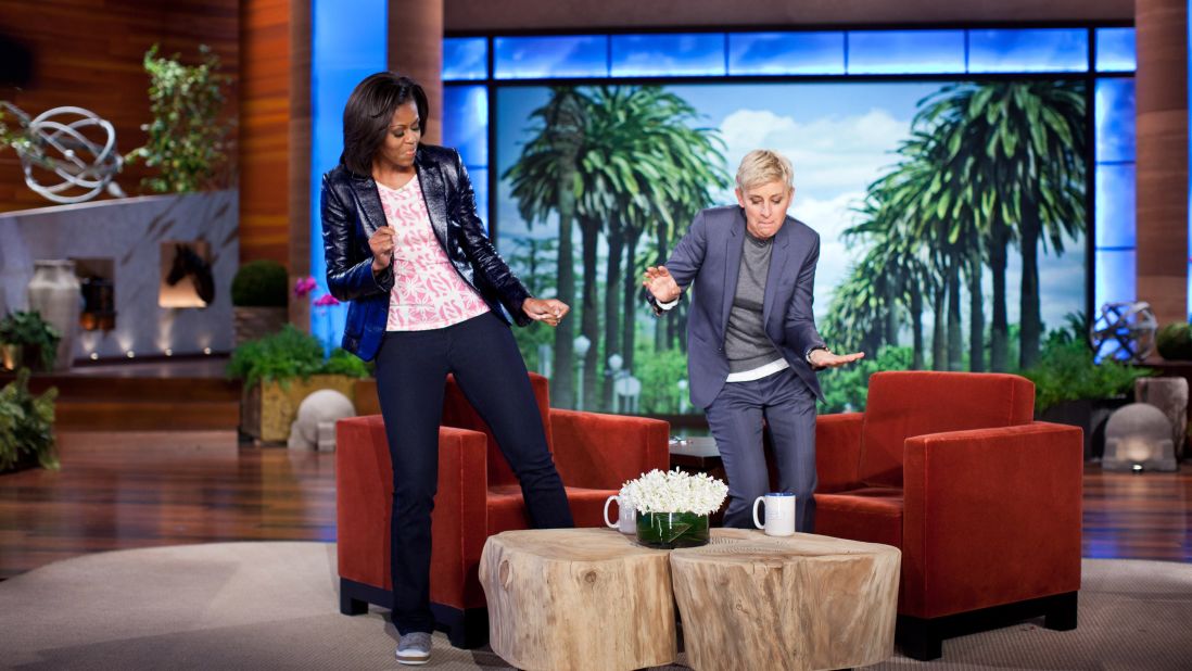 First lady Michelle Obama and Ellen DeGeneres dance during a taping of "The Ellen DeGeneres Show" marking the second anniversary of Let's Move! in Burbank, California, in 2012. 
