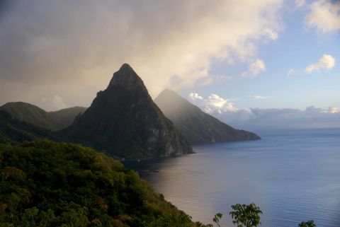 Saint Lucia stretches 27 miles long in the Caribbean Sea.<a href="http://ireport.cnn.com/docs/DOC-1220562"> iReporter Dennis Licht </a>enjoyed "the gorgeous scenery, the lush vegetation and watching the storms roll over the Pitons, as this picture illustrates."