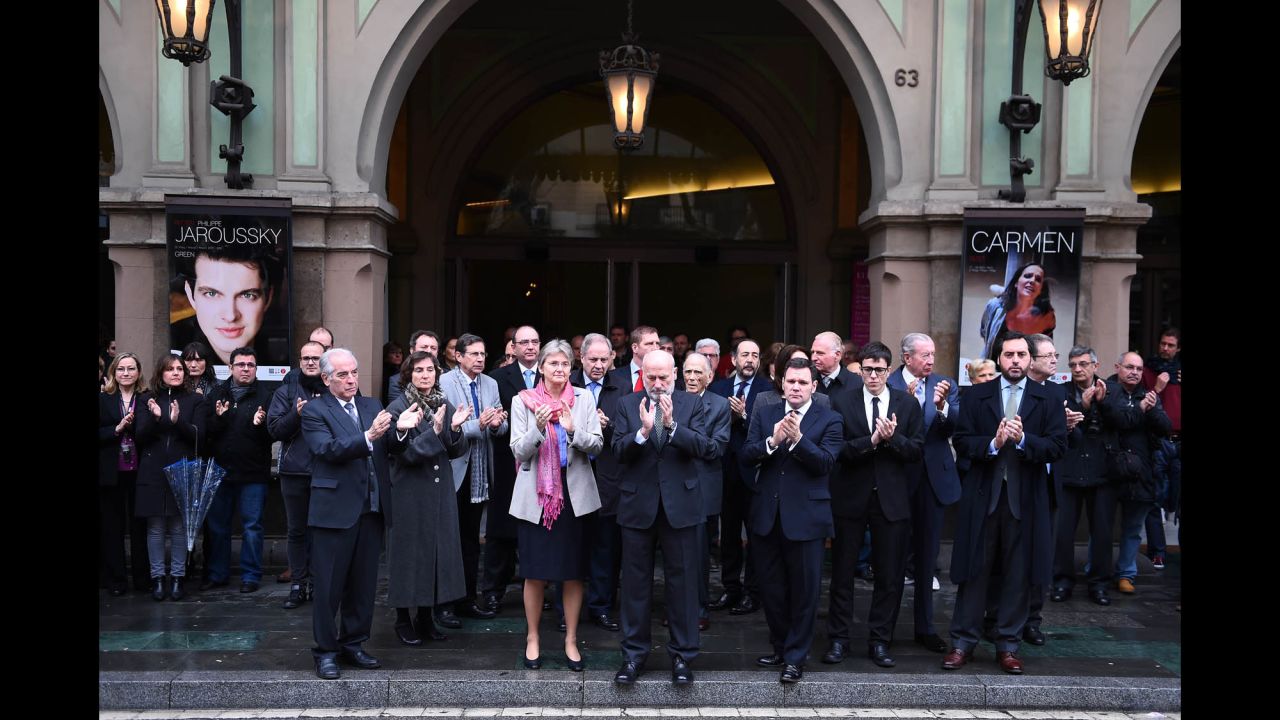 Employees and trustees of the opera house Gran Teatre del Liceu in Barcelona, Spain, gather March 25 to honor Oleg Bryjak and Maria Radner, two opera singers who were aboard the flight.