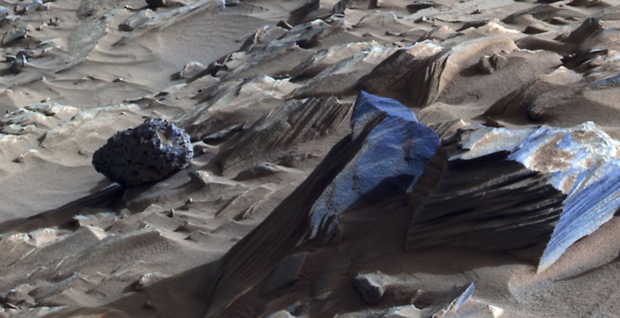 While traversing on and around the ancient volcanic feature called Home Plate, Spirit took many images of finely layered and more frothy looking volcanic rocks. 