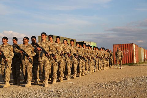 Members of the SOLI-trained Nineveh Plain Protection Units march in formation. 