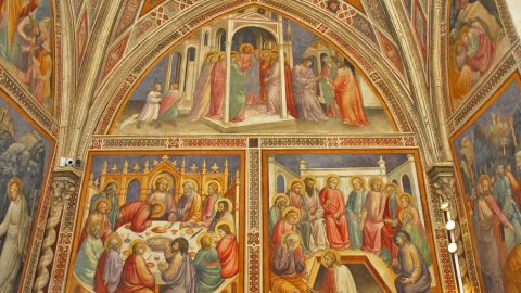 The pharmacy's library still carries 14th century frescoes from when it was a church sacristy.