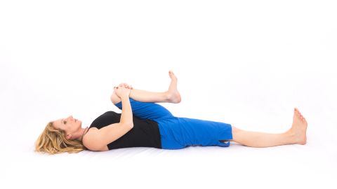 Supine bent-knee twist: Stretches hip, groin and low-back muscles. 