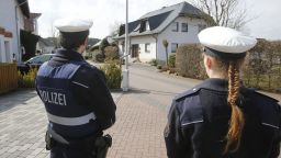 Police stand guard near the house of co-pilot Andreas Lubitz in Montabaur, Germany, on Thursday, March 26.