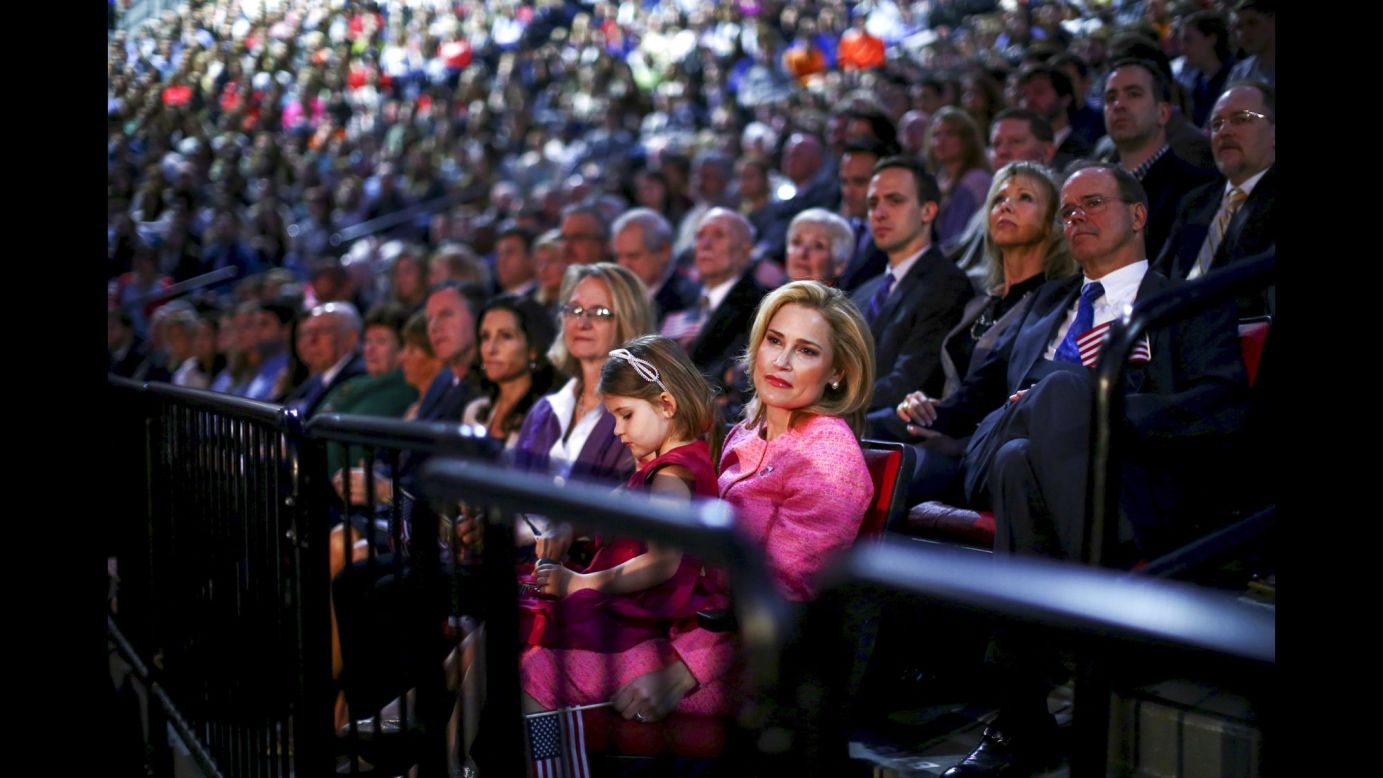 Heidi Cruz holds one of her daughters as her husband, <a href="http://www.cnn.com/2013/09/24/politics/gallery/ted-cruz/index.html" target="_blank">U.S. Sen. Ted Cruz</a>, speaks in Lynchburg, Virginia, on Monday, March 23. The Texas Republican announced that he would be running for President.