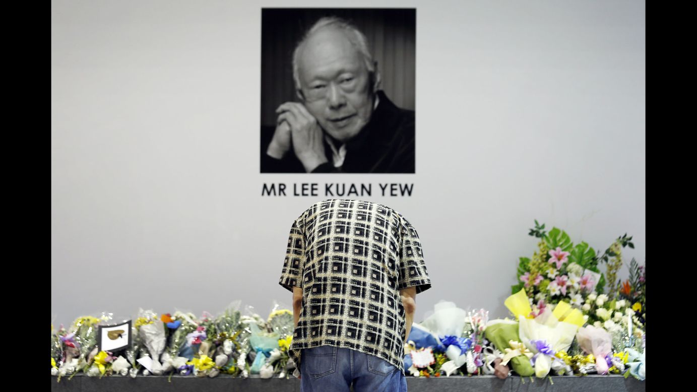 A man in Singapore pays his respects to Lee Kuan Yew, the country's founding Prime Minister, on Monday, March 23. <a href="http://www.cnn.com/2015/03/22/asia/singapore-lee-kuan-yew-dies/index.html" target="_blank">Lee died earlier in the day</a> at the age of 91. He co-founded the city-state in 1965 when it declared its independence from Malaysia, and he was Prime Minister for more than three decades.