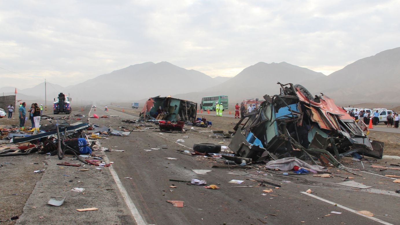 Damaged vehicles litter a coastal highway in Huarmey, Peru, on Monday, March 23. <a href="http://www.cnn.com/2015/03/23/americas/peru-bus-crash/index.html" target="_blank">A crash involving three buses and a freezer truck</a> killed at least 37 people in the northern city, the country's Ministry of Health said.