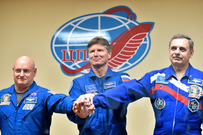 From left, Kelly, Padalka and Kornienko pose after a news conference at the Baikonur Cosmodrome on Thursday, March 26.