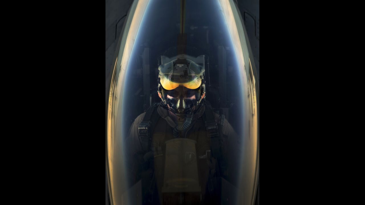 A U.S. Air Force pilot flies a F-16 Fighting Falcon below a KC-135 tanker while being refueled in midair on June 29, 2014. The Fighting Falcon is a compact fighter that is highly maneuverable and has proved itself in air-to-air combat and air-to-surface attack.