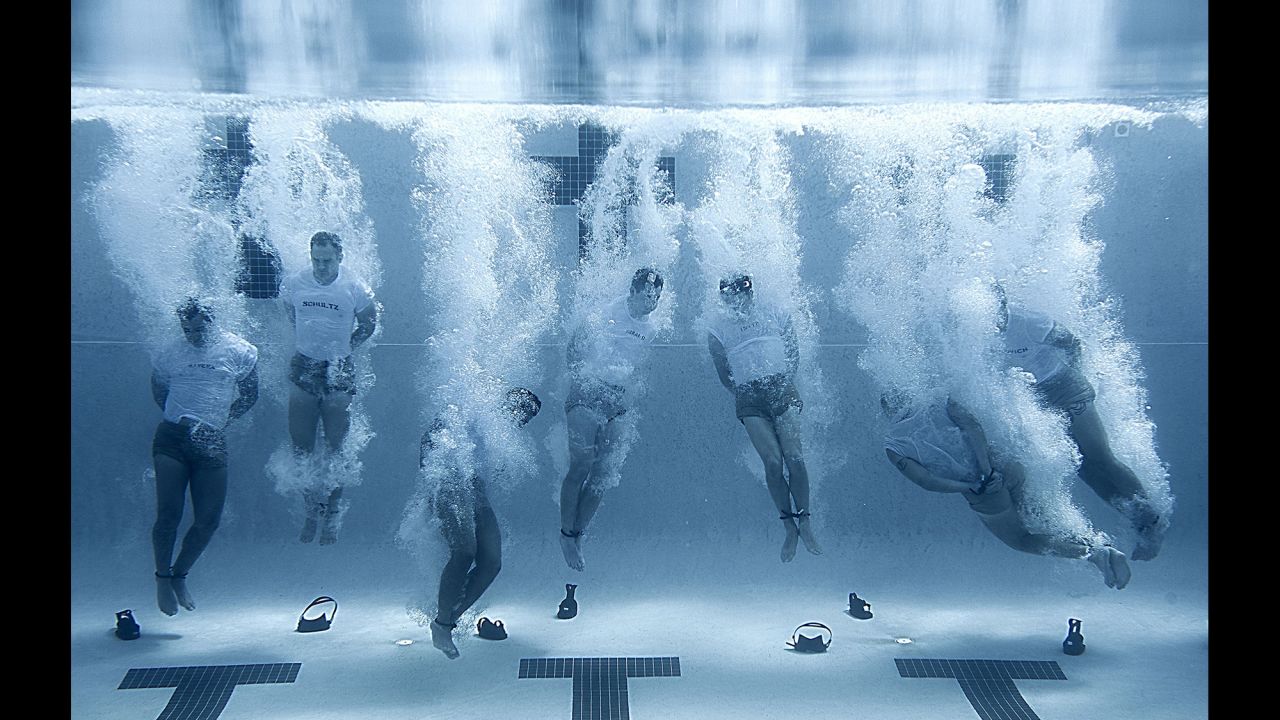 Members of the Air Force's Special Tactics Training Squadron plunge into a swimming pool with their hands and feet bound before bouncing up to the surface to breathe. The drown-proofing exercise teaches students to remain calm in water during a stressful situation -- a skill that is vital during real-world operations. 
