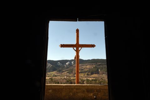 A cross is pictured at Seyne-les-Alpes, France, on March 27, a day after families of crash victims arrived near the plane crash site. 
