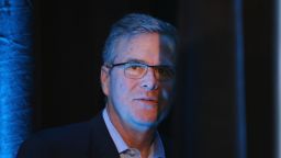 Former Florida Governor Jeb Bush waits to be introduced at the Iowa Ag Summit on March 7, 2015 in Des Moines, Iowa.