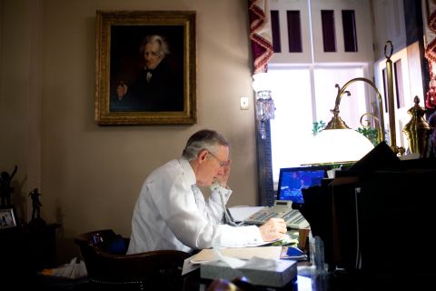 Reid talks with fellow Democratic Senators about their appearances on Sunday talk shows in his office on Capitol Hill on November 21, 2009, in Washington, D.C. 