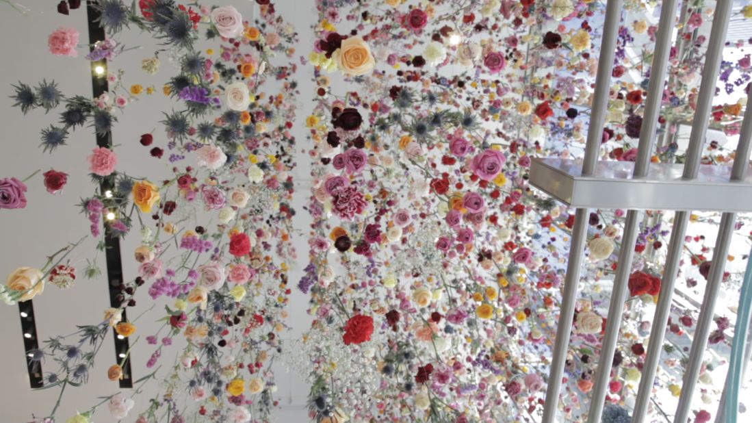 In Times Square, Law hung 16,000 flowers that gradually dried above visitors. Over the years she has developed techniques to best preserve her flowers, consulting with experts at the Victoria and Albert Museum in London.