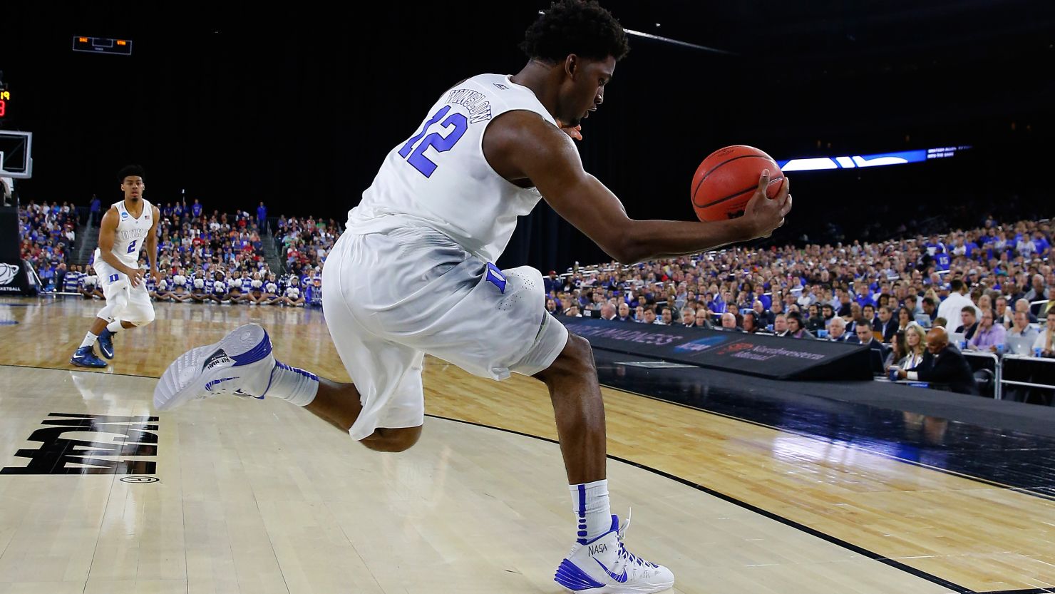 Justise Winslow of the Duke Blue Devils saves the ball from going out of bounds against the Utah Utes during a South Regional Semifinal game on Friday in Houston.