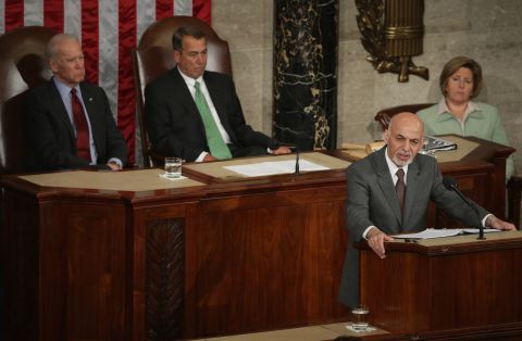 Afghanistan President Ashraf Ghani (right) expresses his country's gratitude for America's fiscal commitment and military sacrifices during an address to a joint meeting of the United States Congress with Vice President Joe Biden (left) and Speaker of the House John Boehner (R-OH) in the House Chamber of the U.S. Capitol March 25 in Washington.