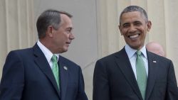U.S. President Barack Obama walks with Speaker of the House John Boehner as they depart the annual Friend's of Ireland luncheon on Capitol Hill in Washington, DC, March 17, 2015.