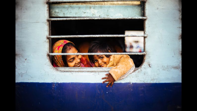 <strong>"Happiness" by Wilson Lee</strong><br />Photographer's description: Simplicity is happiness. I took this photo at a train station in Jaipur when I was traveling in India last year. Wandering around the platform, I attempted to capture the atmosphere before the train's departure.