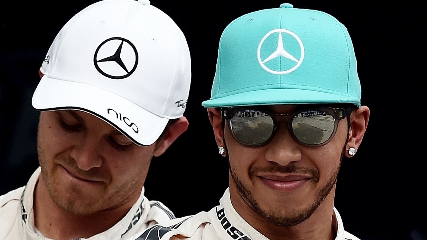 Lewis Hamilton will start the Malaysia GP in pole, with teammate Nico Rosberg in third.