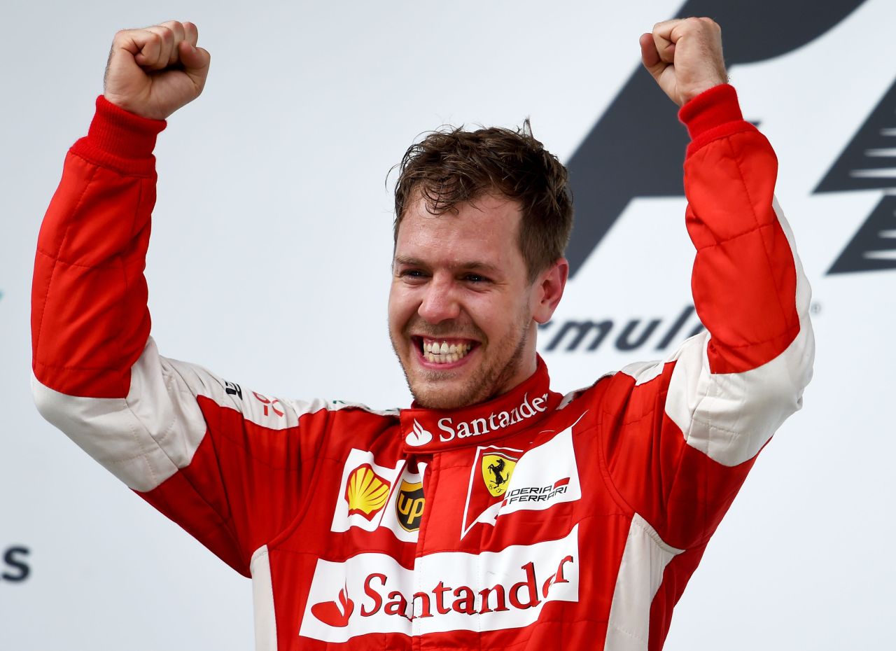 An ecstatic Sebastian Vettel savors his first victory for Ferrari and the 40th of his career.
