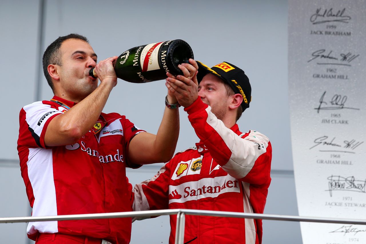 A champagne moment for Vettel and the Ferrari team after the surprise victory in Malaysia.