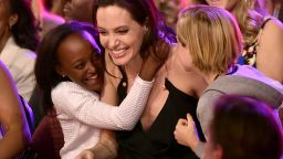 Actress Angelina Jolie hugs Zahara Marley Jolie-Pitt, left, and Shiloh Nouvel Jolie-Pitt, right, after winning award for Favorite Villain in 'Maleficent' during Nickelodeon's 28th Annual Kids' Choice Awards held at The Forum on March 28, 2015 in Inglewood, California.