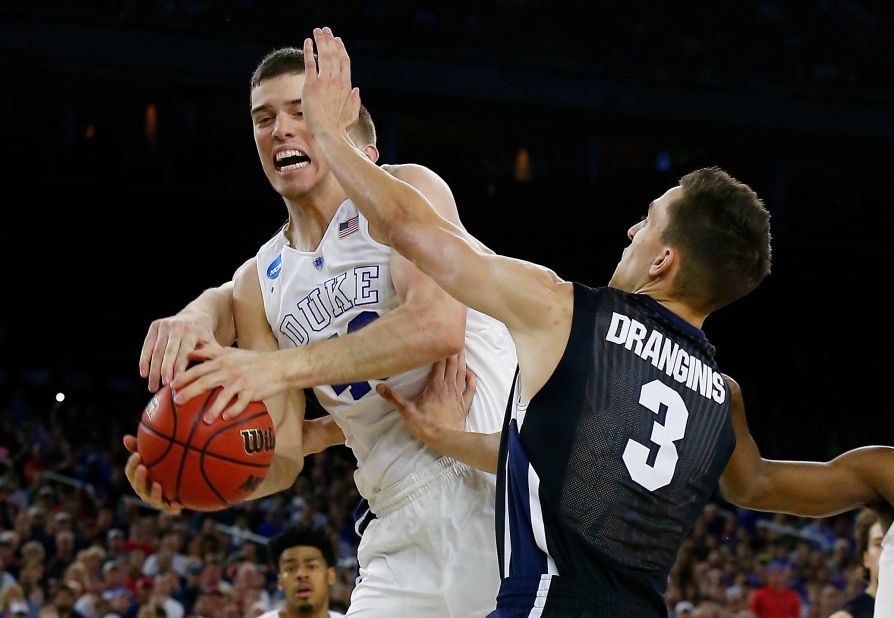 Marshall Plumlee (40) of the Duke Blue Devils and Kyle Dranginis (3) of the Gonzaga Bulldogs go for a rebound during the South Regional Final of the 2015 NCAA Men's Basketball Tournament at NRG Stadium on March 29, 2015 in Houston, Texas.