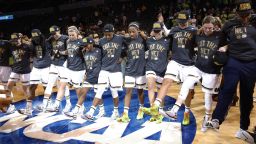 Notre Dame celebrates after defeating Baylor 77-68 in a regional final in the NCAA women's college basketball tournament, Sunday, March 29, 2015, in Oklahoma City. (AP Photo/Sue Ogrocki)