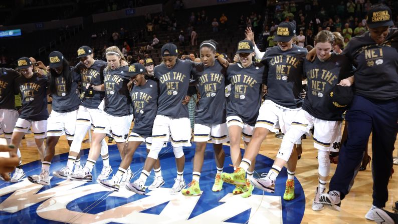 Notre Dame basketball players celebrate after their NCAA Tournament win over Baylor on Sunday, March 29. It is the fifth year in a row that Notre Dame will be playing in the women's Final Four.