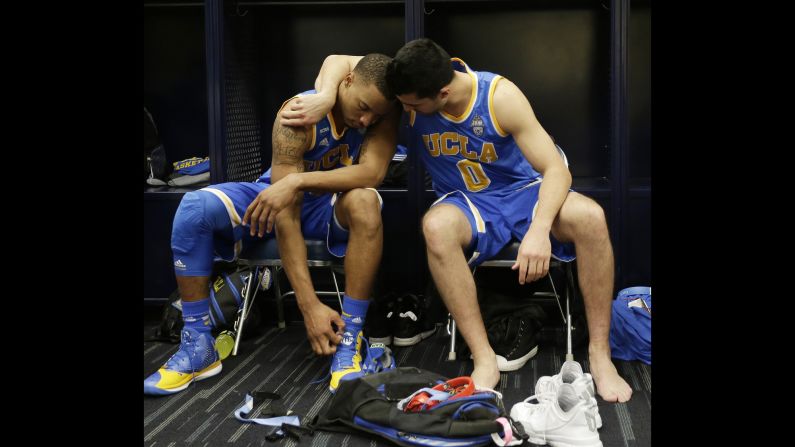 UCLA's Nick Kazemi, right, consoles teammate Norman Powell after the Bruins lost to Gonzaga in the NCAA Tournament on Friday, March 27.