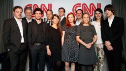 Award winners are photographed with CNN London Bureau Chief Tommy Evans, center, and Nina dos Santos, 3rd from right.