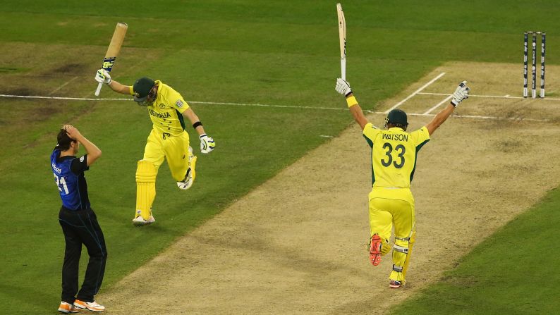 Australian cricketers Steve Smith and Shane Watson raise their arms in celebration after winning the Cricket World Cup on Sunday, March 29. Australia defeated New Zealand by seven wickets in the final, which was played in Melbourne. It is Australia's fifth World Cup title.