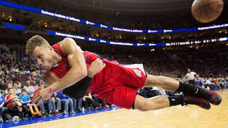 Los Angeles Clippers forward Blake Griffin dives to save a loose ball Friday, March 27, in Philadelphia.