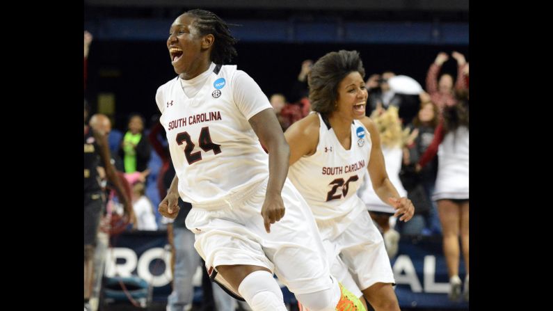 Aleighsa Welch, left, and South Carolina teammate Tina Roy celebrate after their NCAA Tournament victory over Florida State on Sunday, March 29. The Gamecocks will be making their first Final Four appearance in school history when they face Notre Dame on April 5.