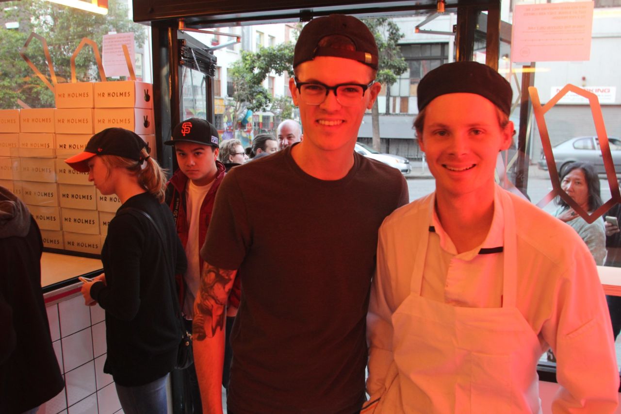 Mr. Holmes Bakehouse co-owners Aaron Caddel (right) and Ry Stephen bask in the glow of their shop's neon popularity.
