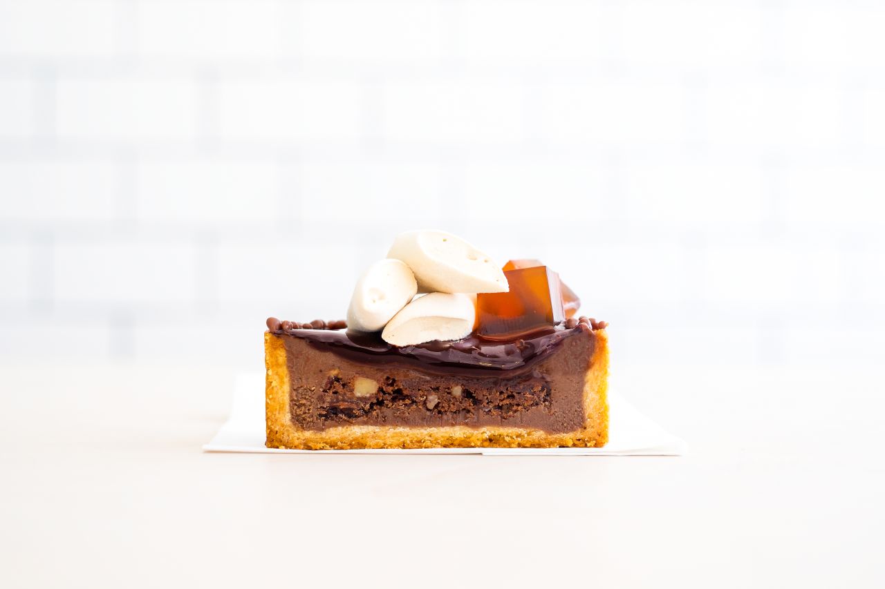 Pastry chef Ry Stephen worked in a Paris pastry shop before relocating to San Francisco. The influence shows in his caffe latte ganache, with brownie sponge, coffee glaze, coffee marshmallow and coffee jelly.