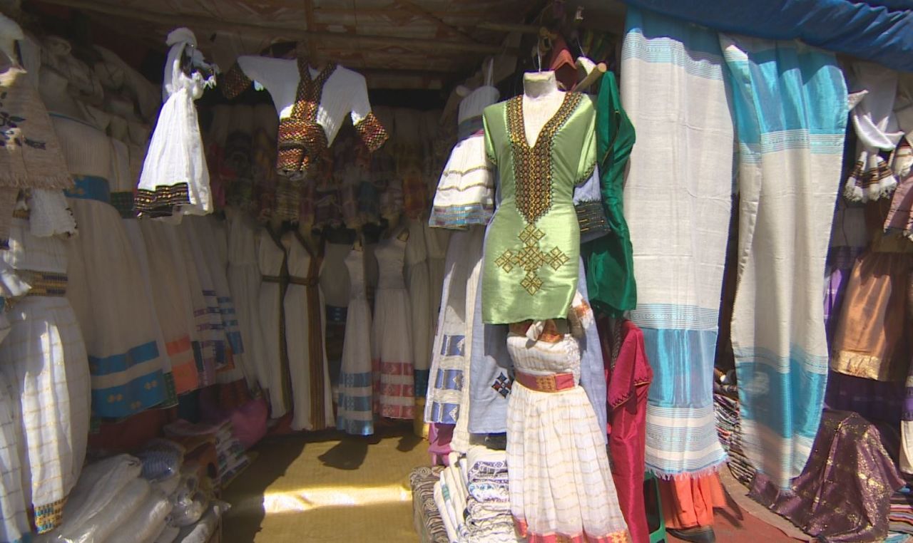 Addis also finds inspiration in the colorful local markets. Ethiopian-made scarves are a popular export, and she likes to sometimes use them as a base for her dresses.
