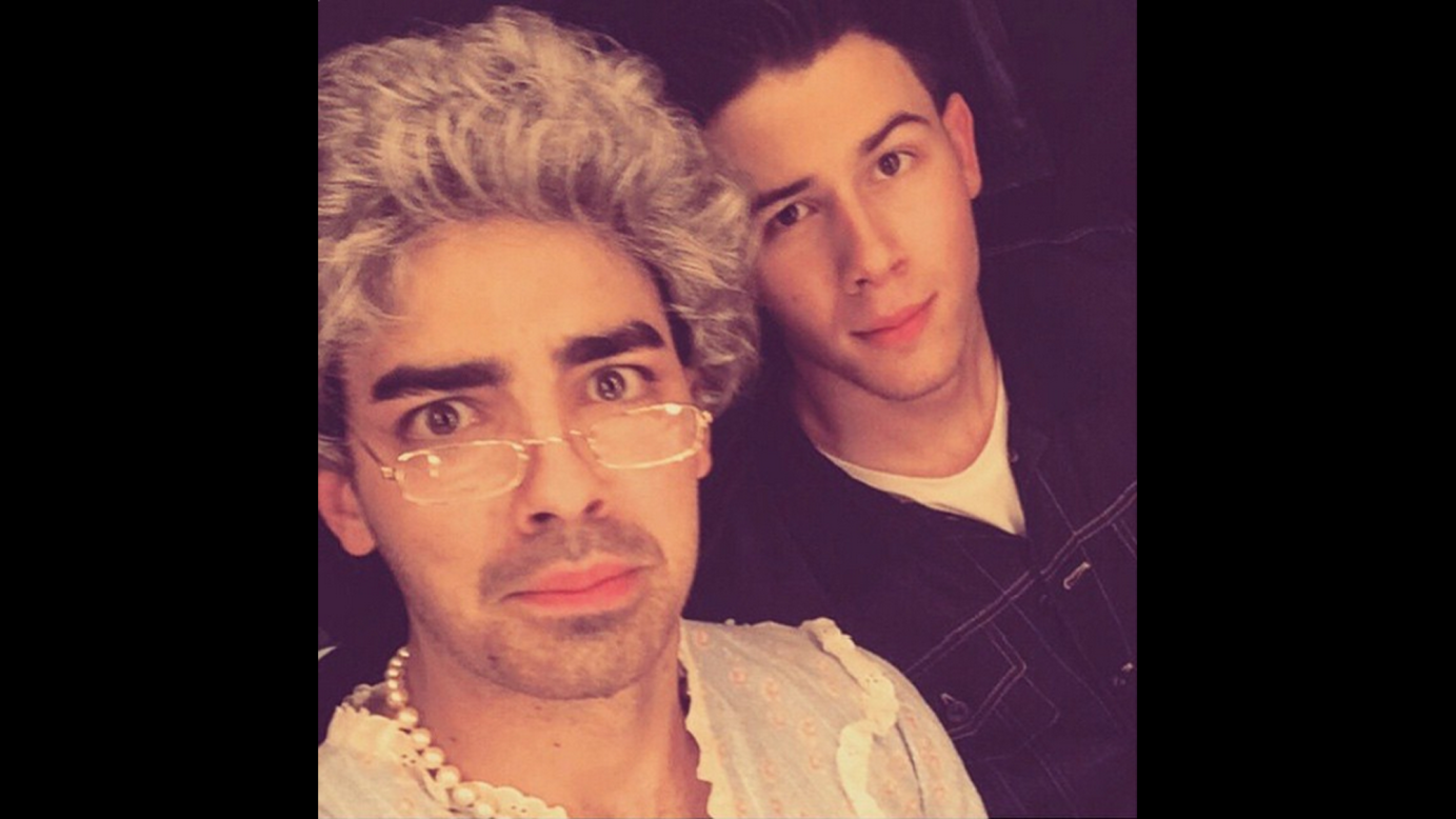Nick Jonas, right, <a href="https://instagram.com/p/0y8fgWEVaM/?taken-by=nickjonas" target="_blank" target="_blank">posted a selfie</a> of him and his brother Joe -- dressed as "Grandma Joe" -- on Saturday, March 28. Nick Jonas was hosting the Nickelodeon Kids' Choice Awards when his brother made an appearance in drag.