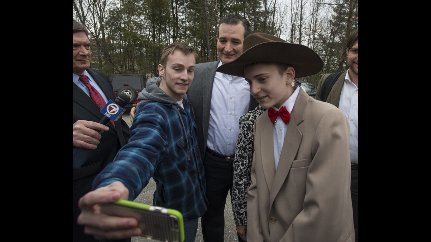 U.S. Sen. Ted Cruz, who recently announced that he is running for president, poses for a selfie while campaigning in Merrimack, New Hampshire, on Friday, March 27.