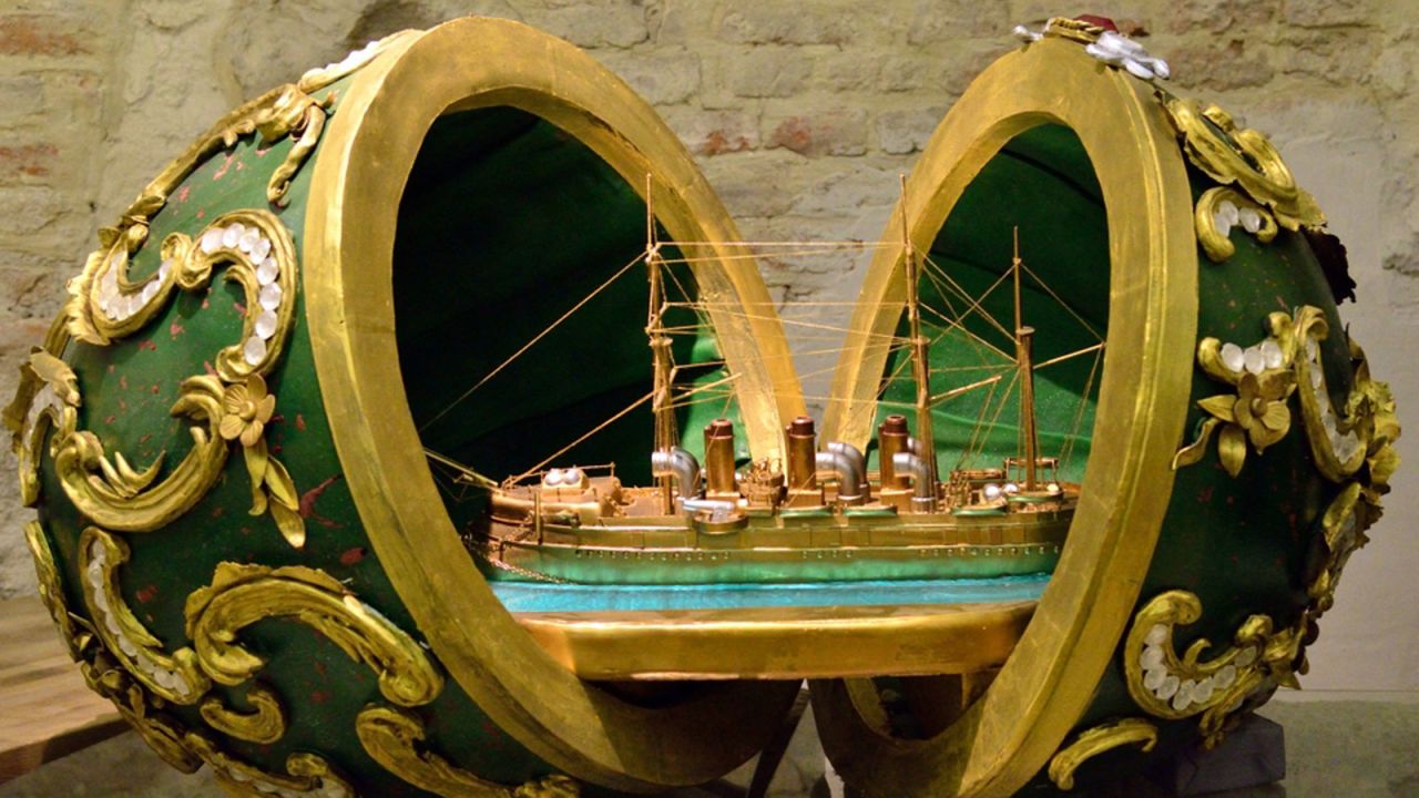 Nothing says "happy birthday" like a cake, shaped like a boat, inside a giant Faberge egg.